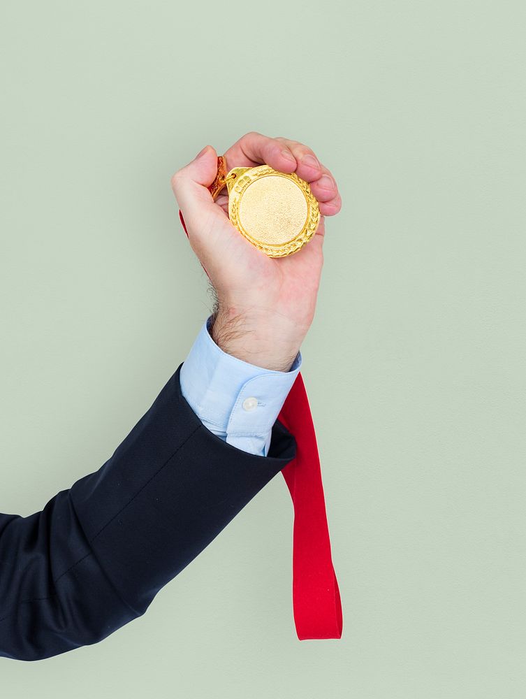 Business Man Holding Trophy