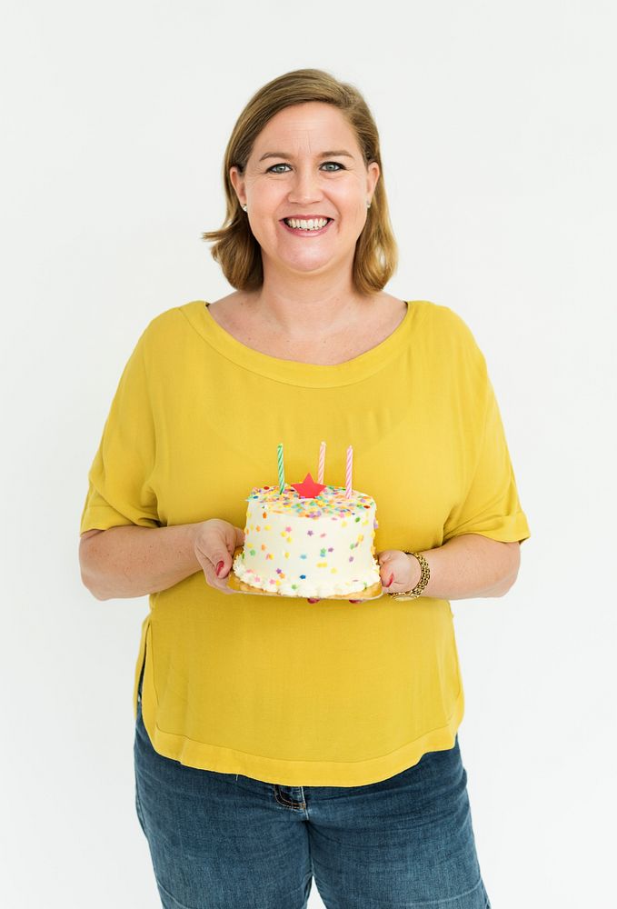 Woman holding a celebration cake