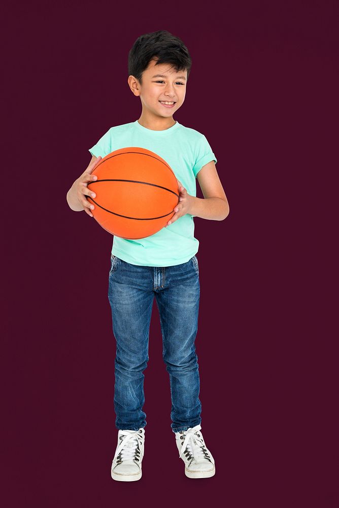 Little Kid With Basketball Concept
