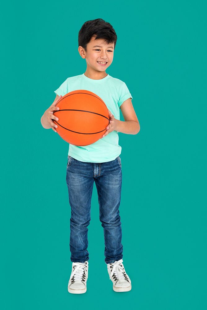 Little Kid With Basketball Concept