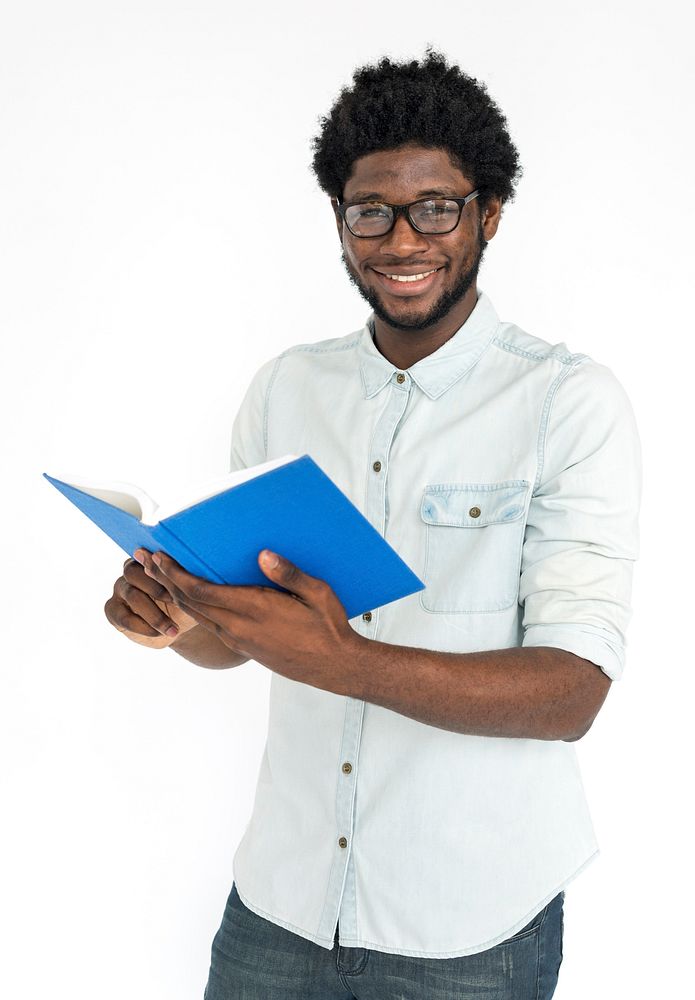 African Man Smiling Happiness Book Reading Concept