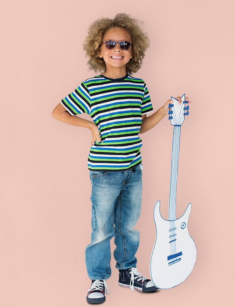 Portrait of a Little African Descent Boy with a Guitar Isolated