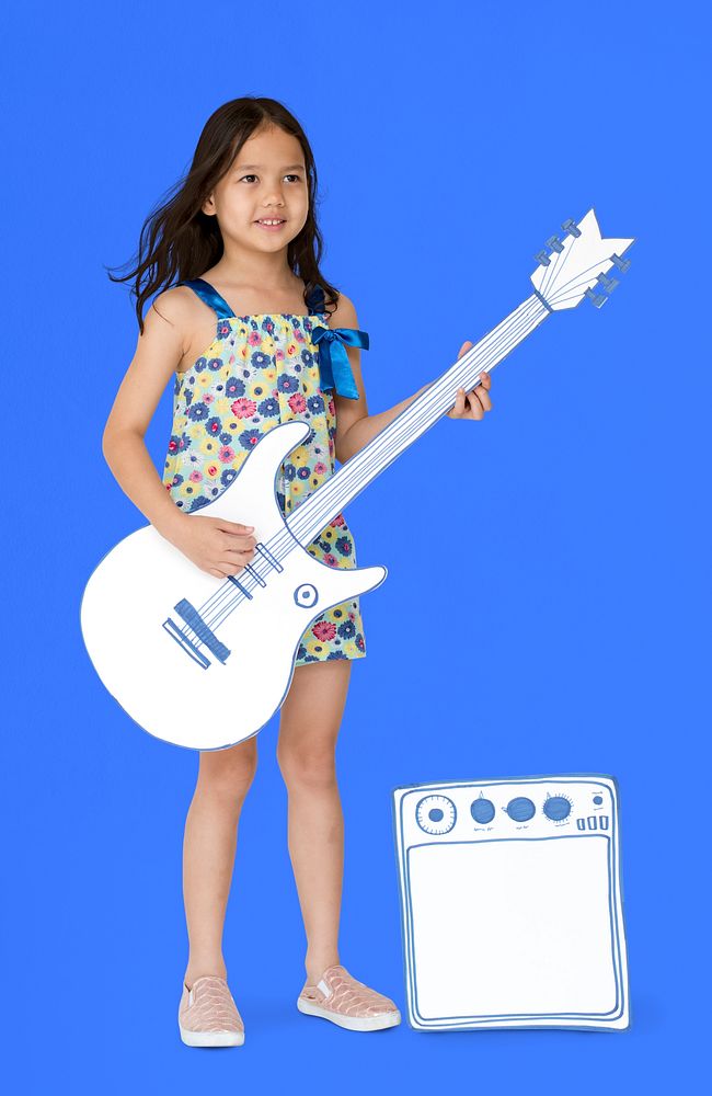 Little Girl Playing Papercraft Guitar