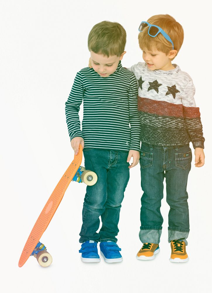 Boys playing skateboard having fun together on white background