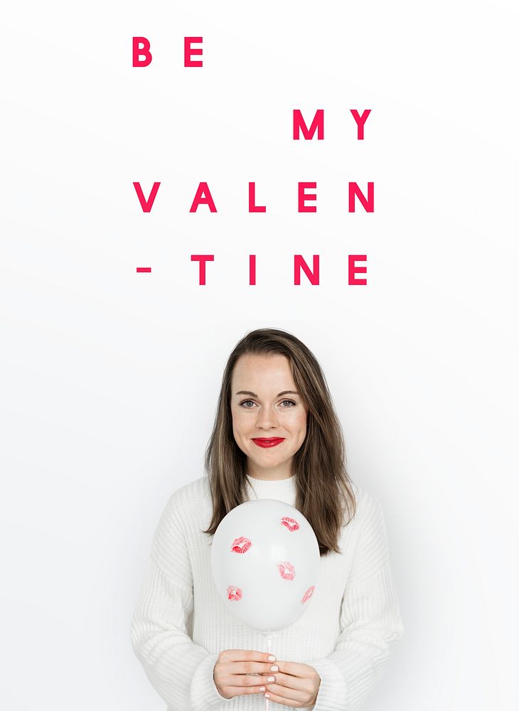 "Be my Valentine" text over a woman holding a ballloon 
