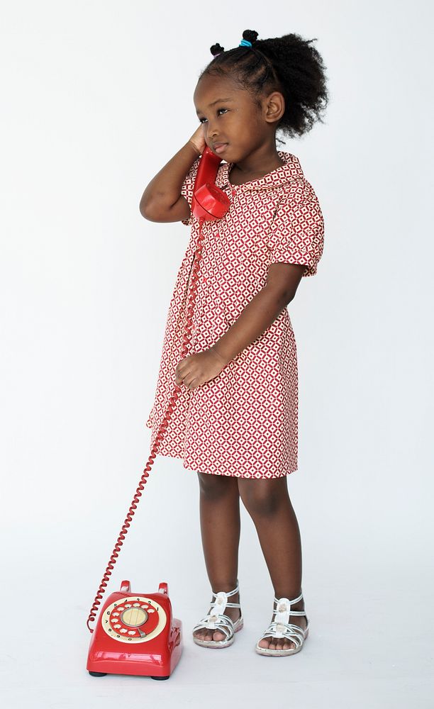 Little Girl Talking on the Phone Communication Studio Portrait