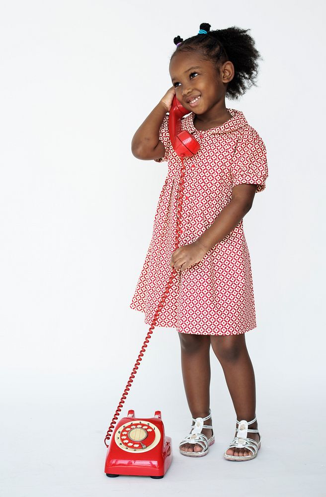 Little Girl Smiling Happiness Talking on the Phone Communication
