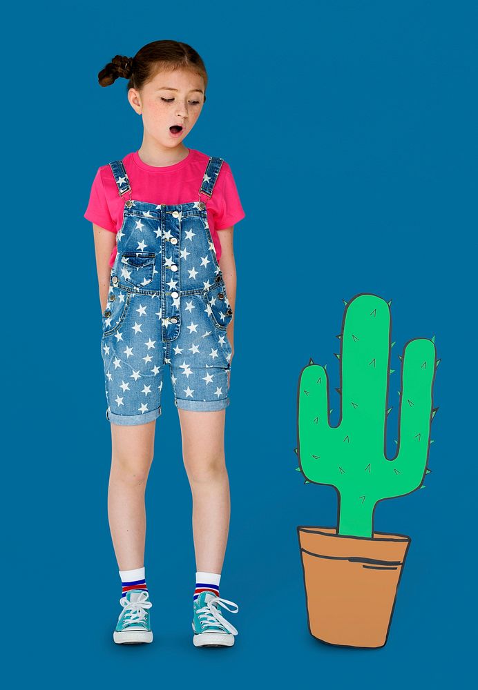 Little Girl Looking Papercraft Cactus