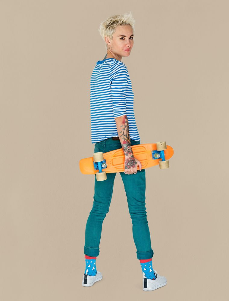 Caucasian Blonde Woman Holding Skateboard