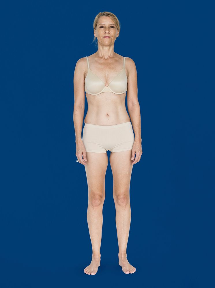 Caucasian Blonde Female Model On Blue Background