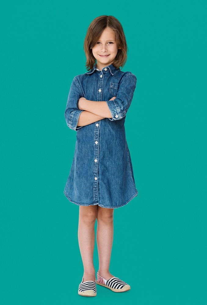 Young white girl kid crossed arms studio full body portrait