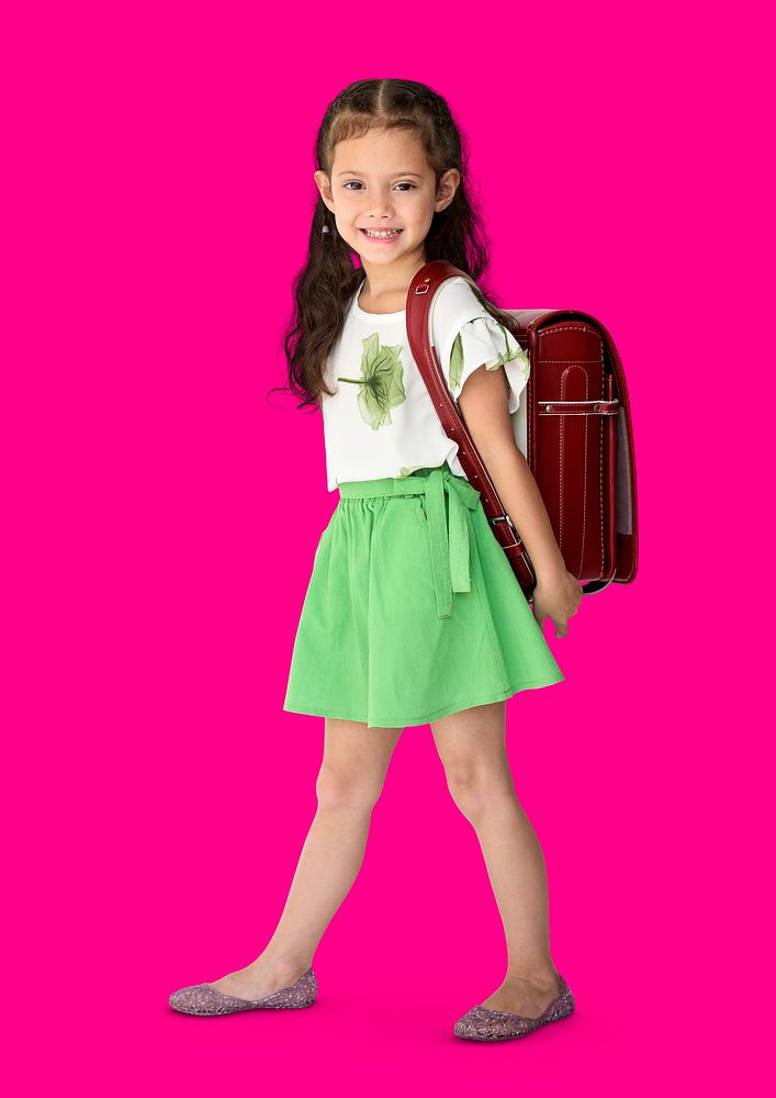 A girl smiling with a school backpack