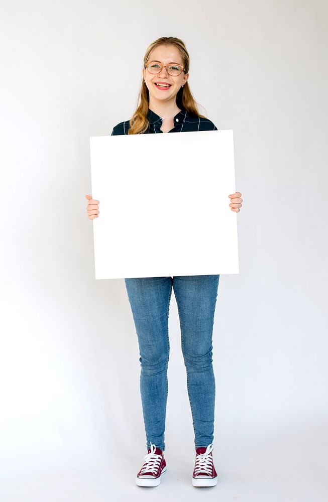 A person holding a white board