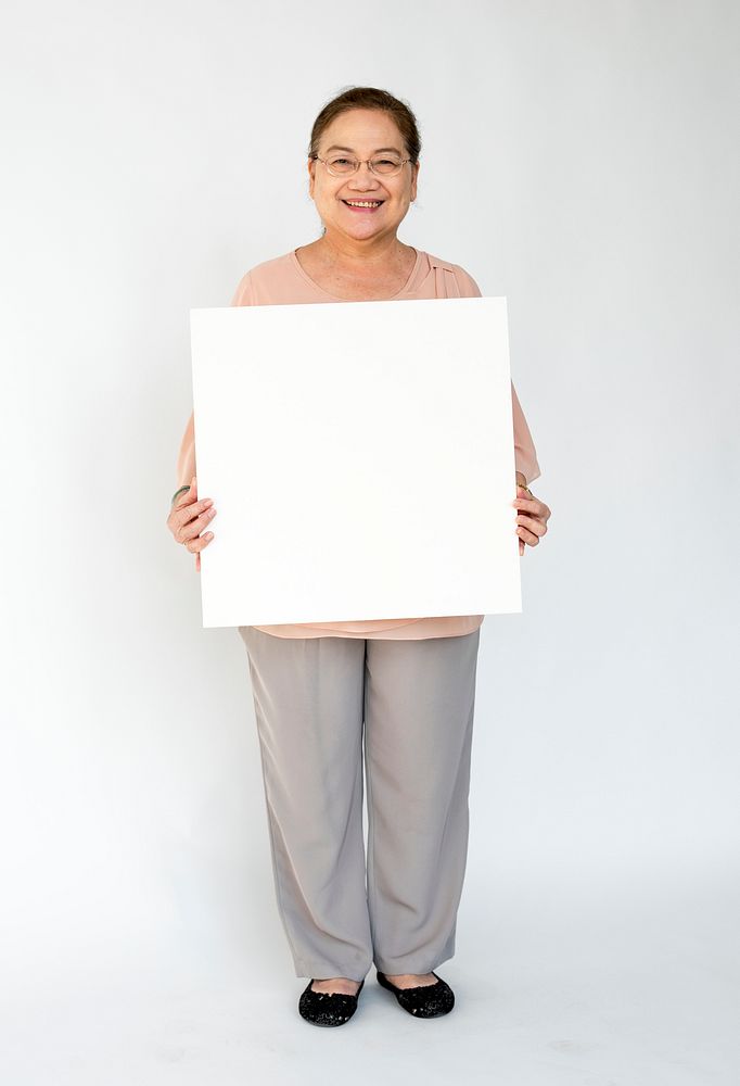 A person holding a white board