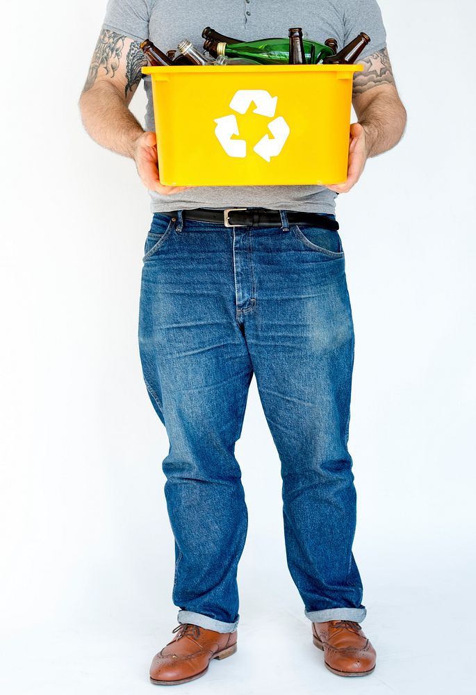 Man standing and holding box of recycle waste