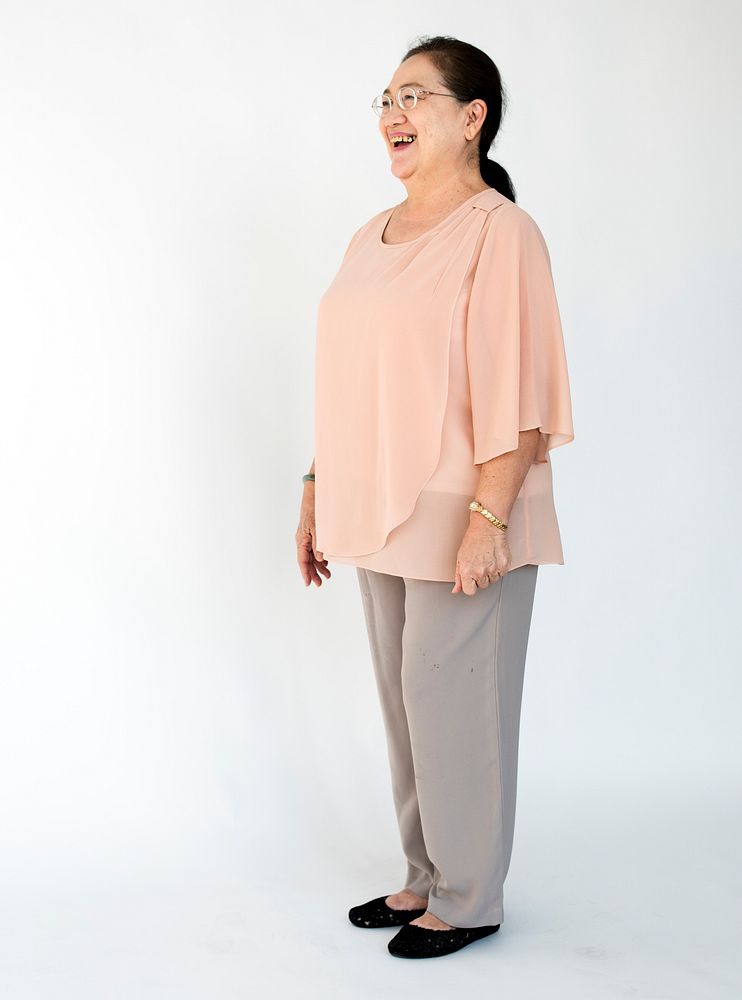 Whole body portrait of an asian woman laughing