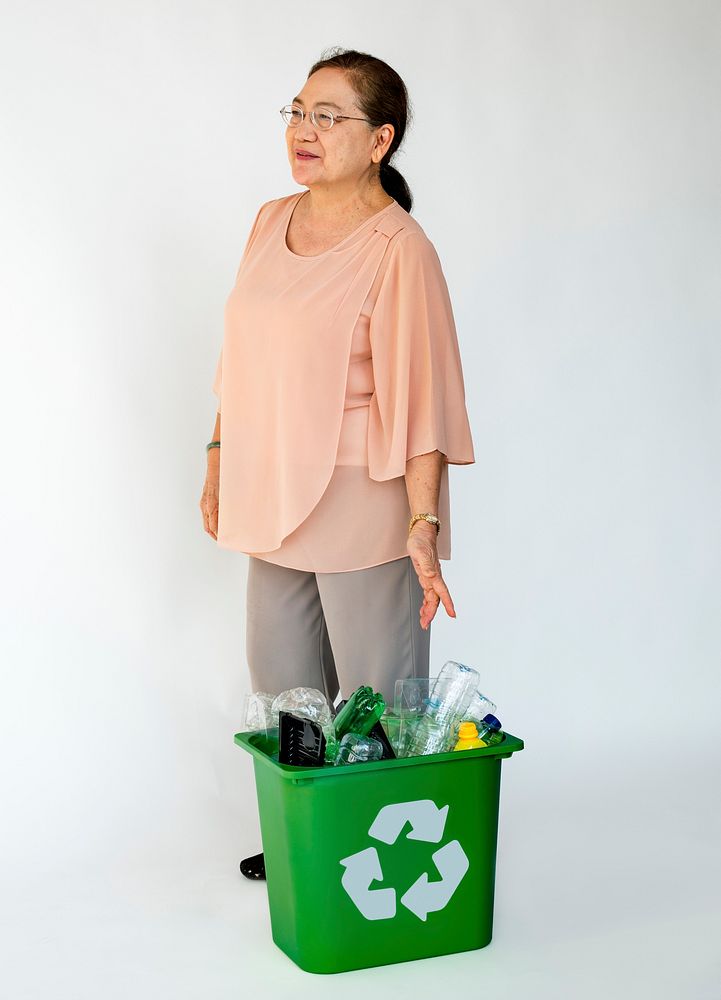 Adult Woman and Separated Plastic Bottles Recyclable