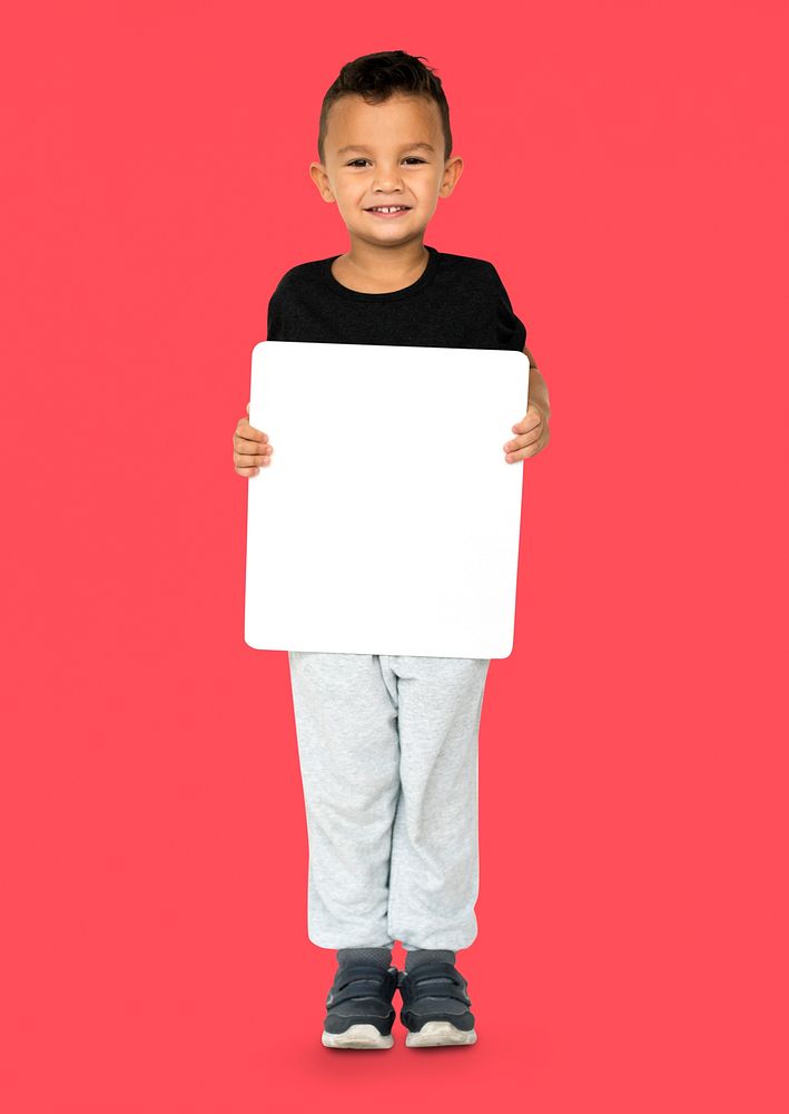 Little Boy Holding Blank Empty Paper Board Studio Portrait