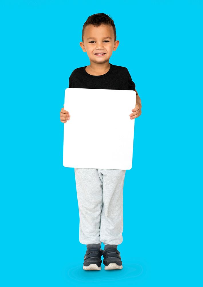 Little Boy Holding Blank Empty Paper Board Studio Portrait
