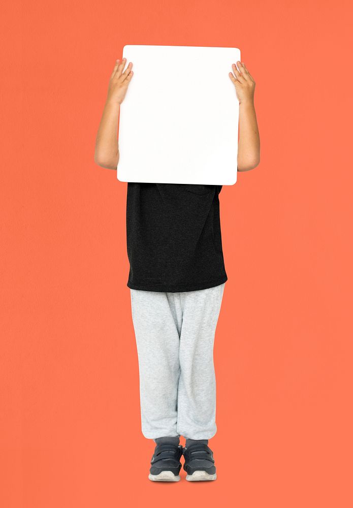 Little Boy Holding Blank Empty Paper Board Covered Face Studio Portrait