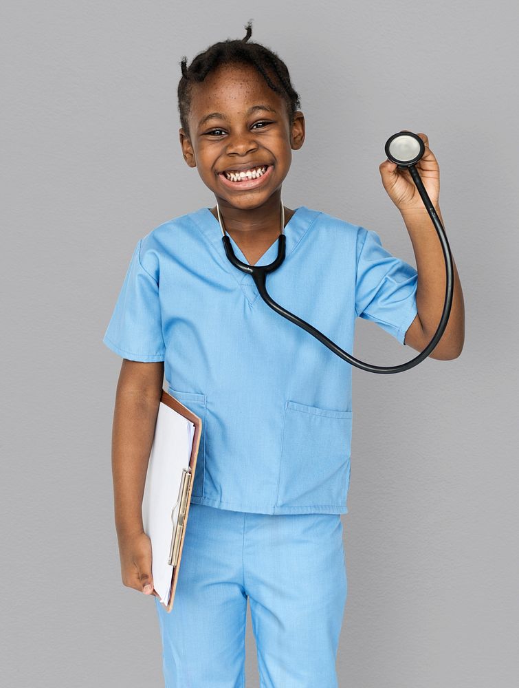 Little girl with doctor dream job smiling