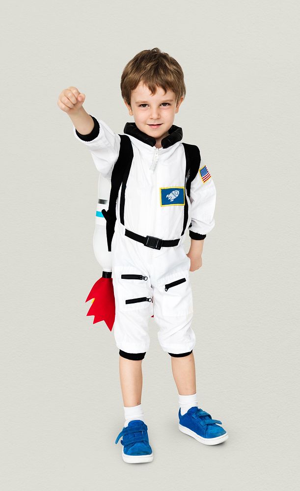 Little boy with astronaut dream job smiling