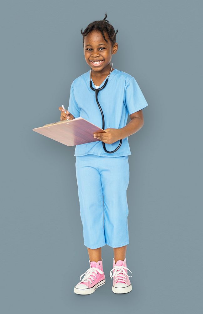 Little girl with doctor dream job smiling