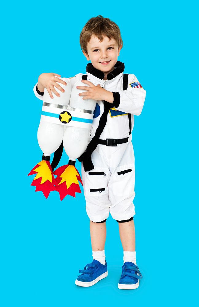 Little boy with astronaut dream job smiling