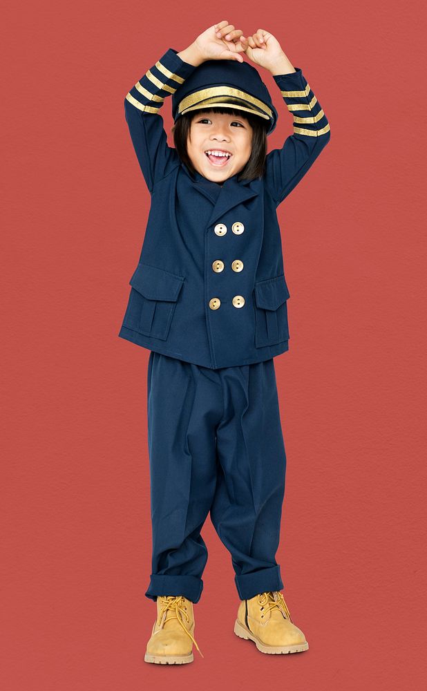 Little boy with pilot dream job smiling