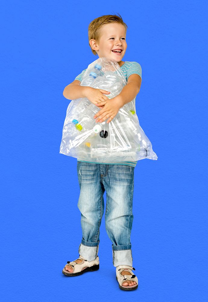 Caucasian Ethnicity Boy holding Bag with Plastic Bottles