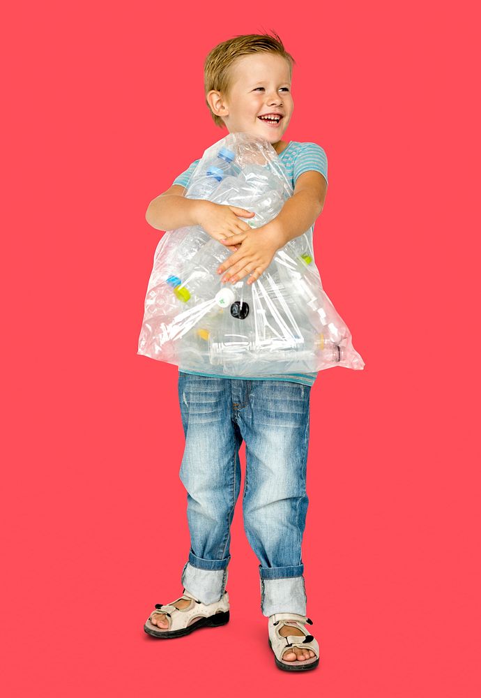 Caucasian Ethnicity Boy holding Bag with Plastic Bottles
