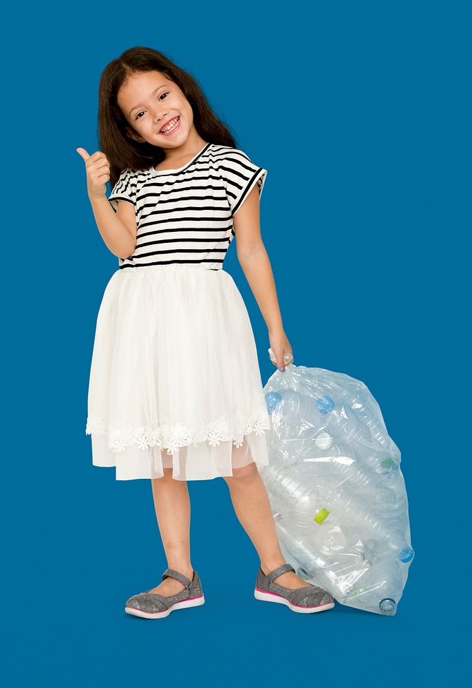 Little Girl Holding Separate Plastic Bottles Studio Portrait