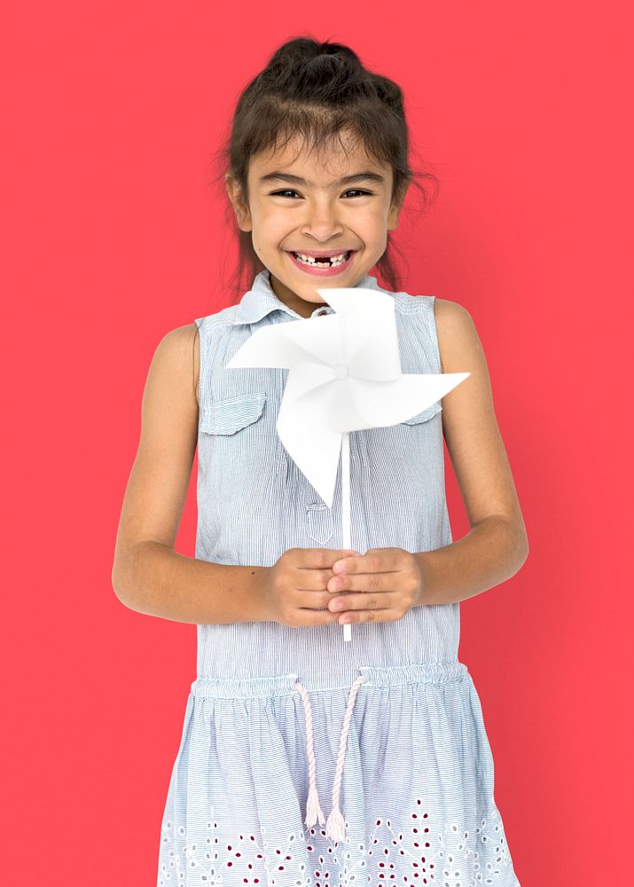 Little Girl Hands Holding Paper Wind Mill Studio Portrait