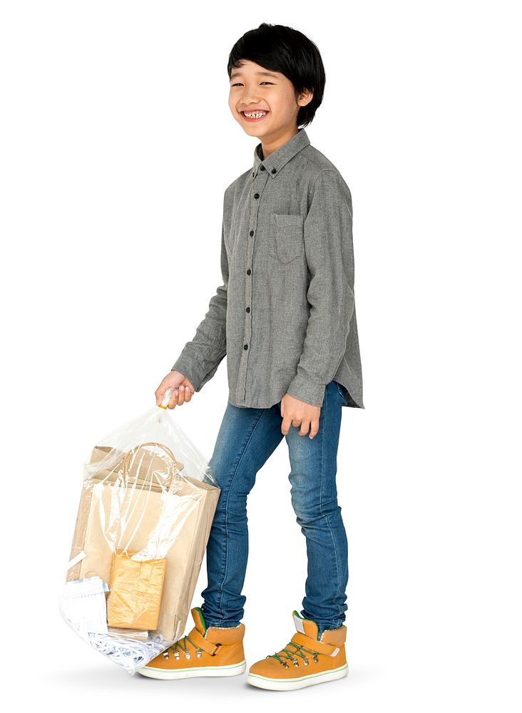 Little Boy Holding Separate Papers Studio Portrait