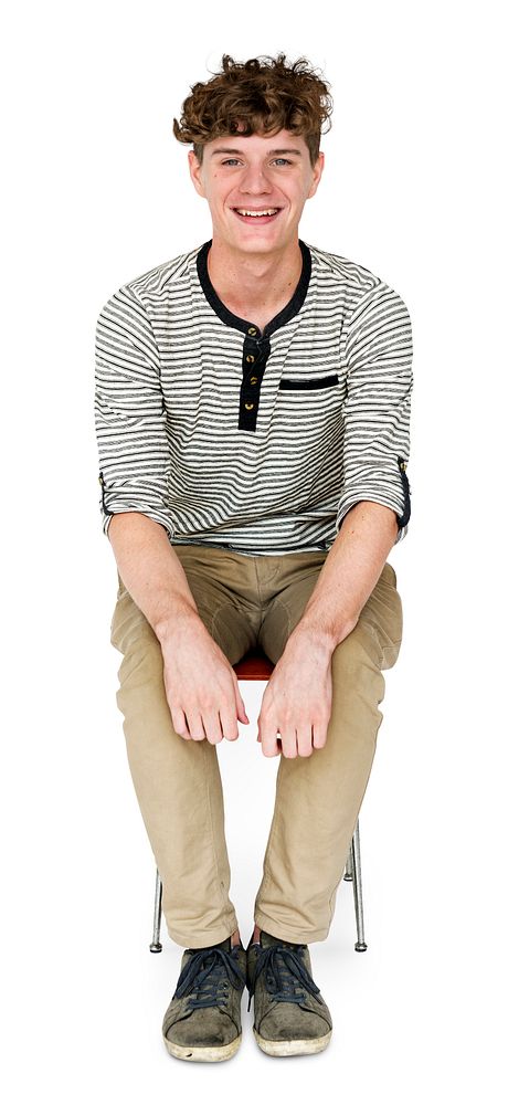 Young Adult Man Sitting with Smile Face Studio Portrait