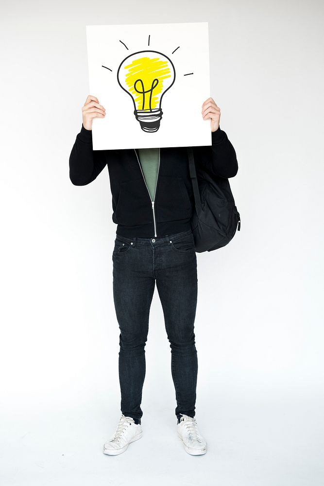 Man holding light bulb banner cover face studio portrait