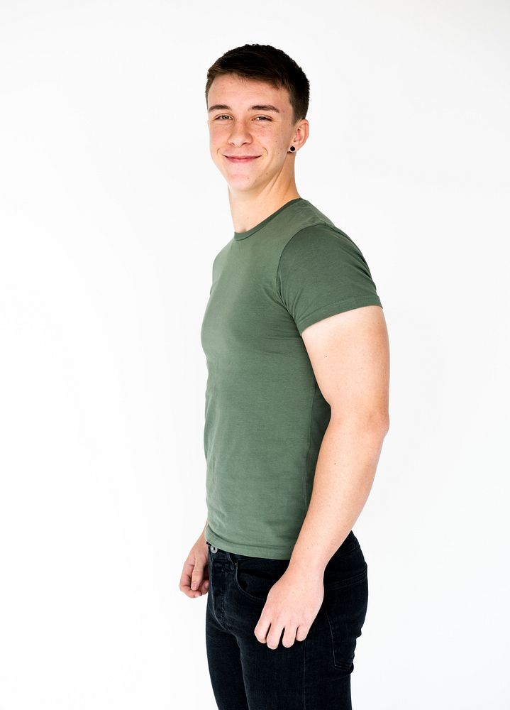 Muscular man smiling casual studio portrait