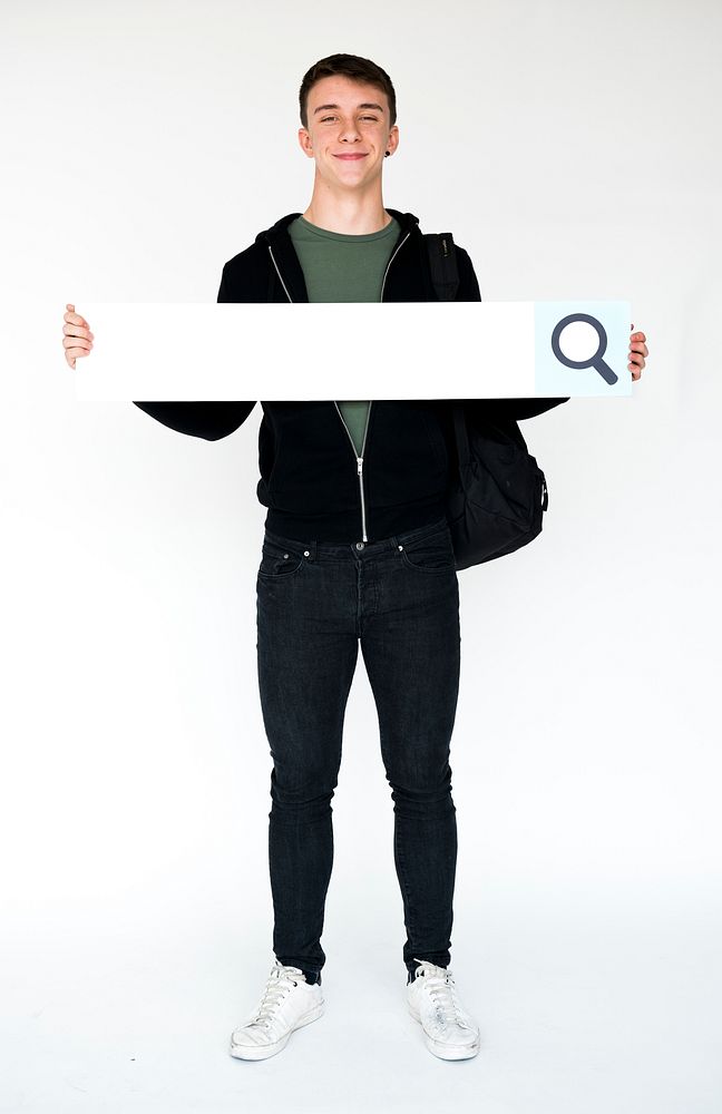 Man holding searching blank banner studio portrait