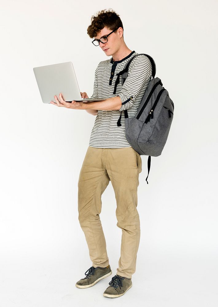 Young adult man using laptop