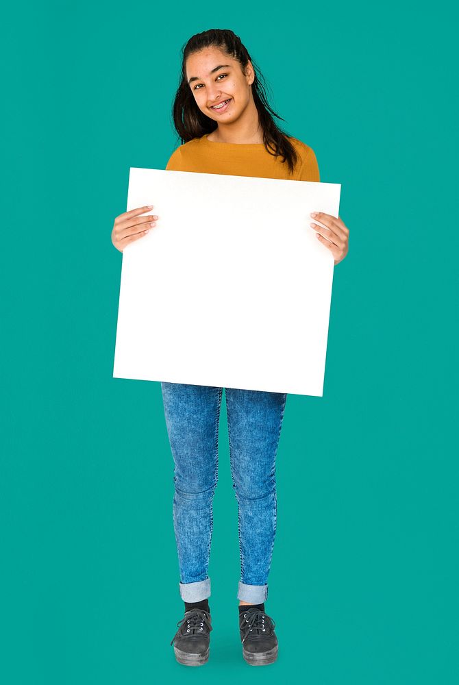 Indian Ethnicity Smiling Girl Standing and Holding Placard