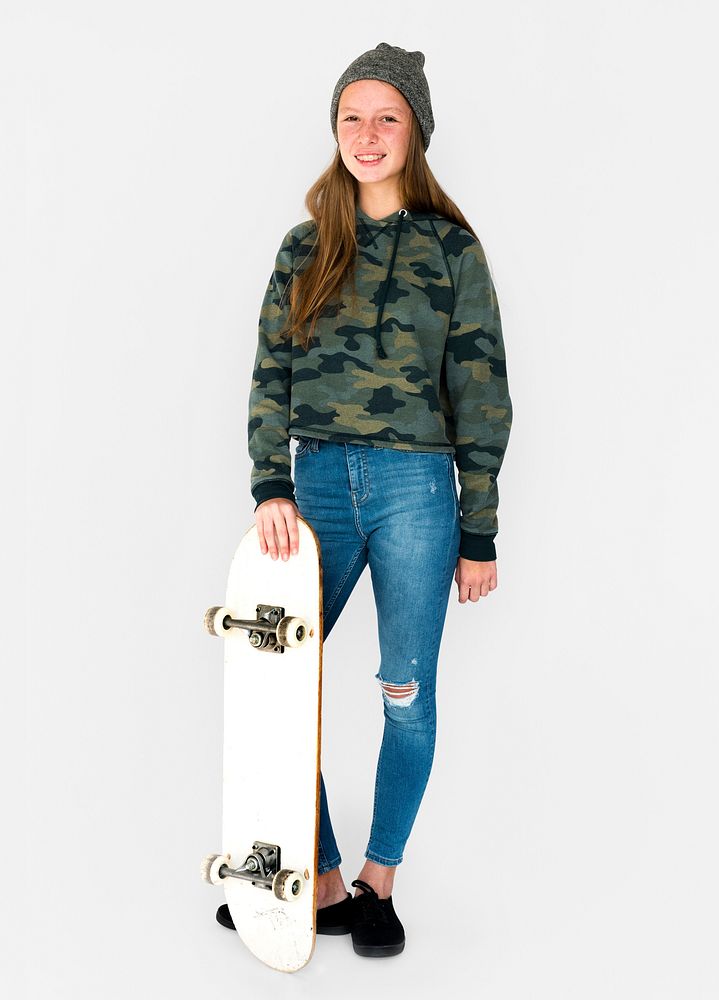 Young student girl standing with skateboard