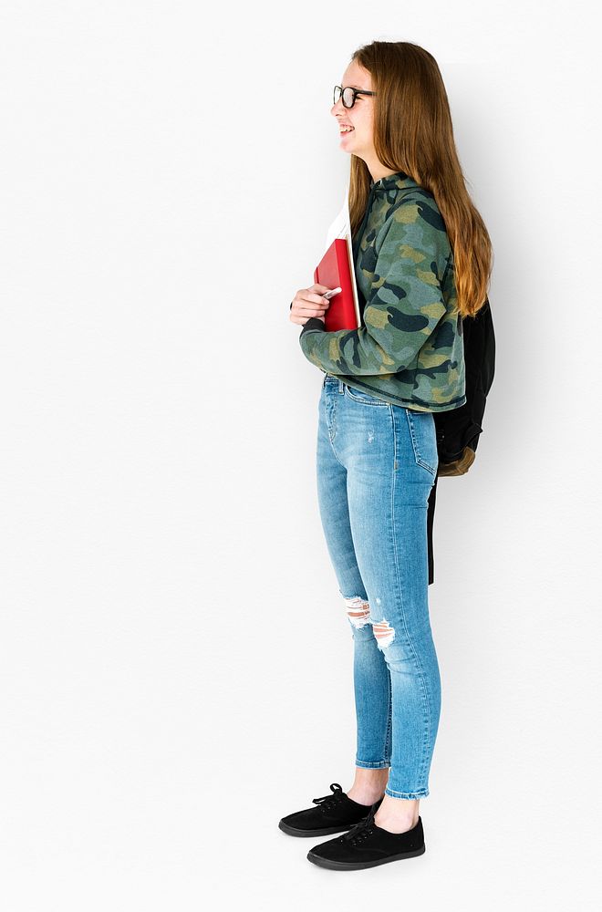 Young Adult Holding Books and School Bag Studio Portrait
