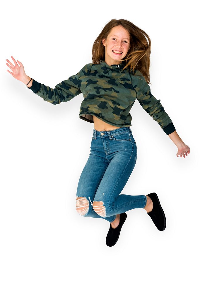 Young Adult Woman Jumping Studio Portrait