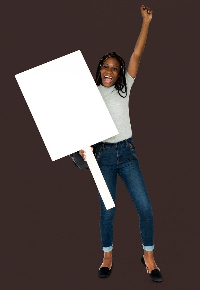 African girl arms raised and holding blank banner