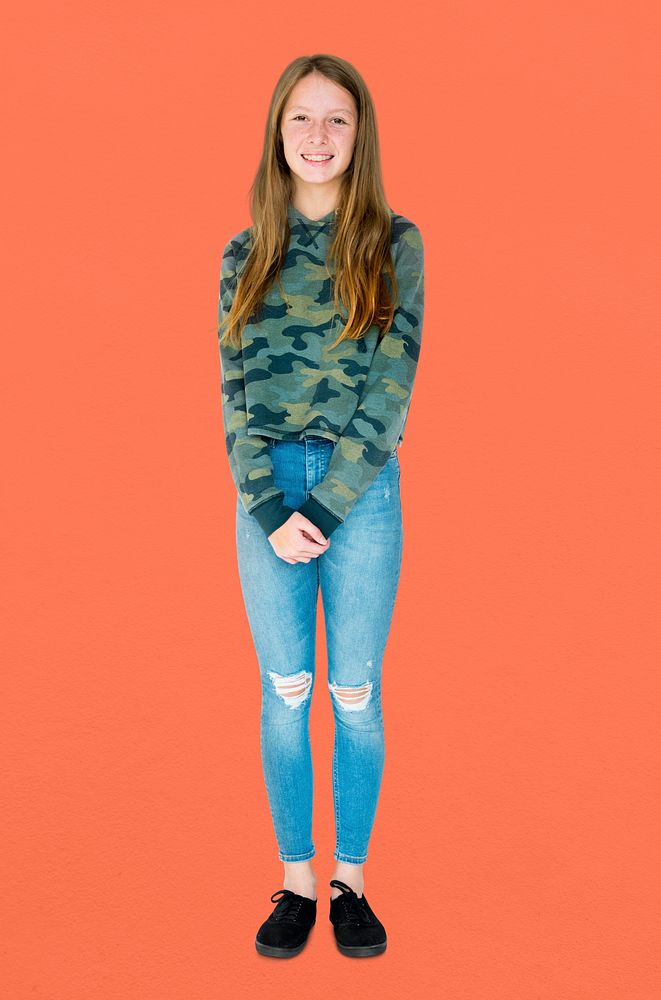 Teenage girl smiling casual studio portrait