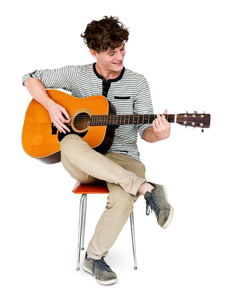 Man guitarist player sitting and playing guitar
