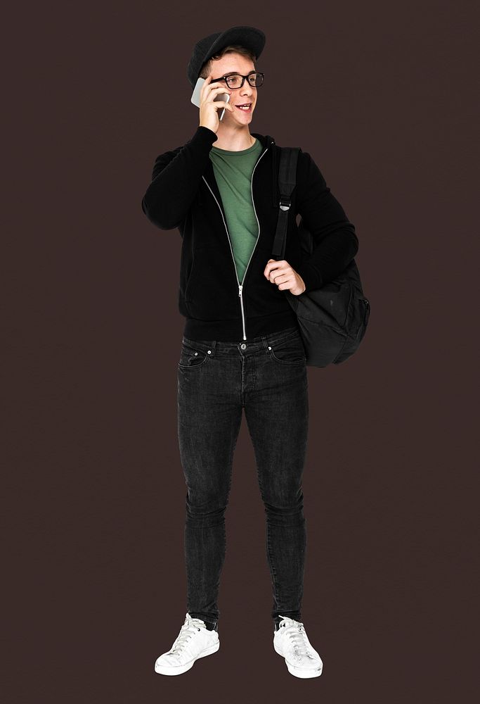 Young man with casual outfit talking phone standing