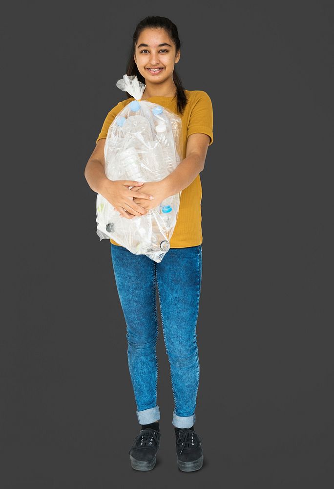 Young Adult Woman Holding Recyclable Plastic Bottles Studio Portrait