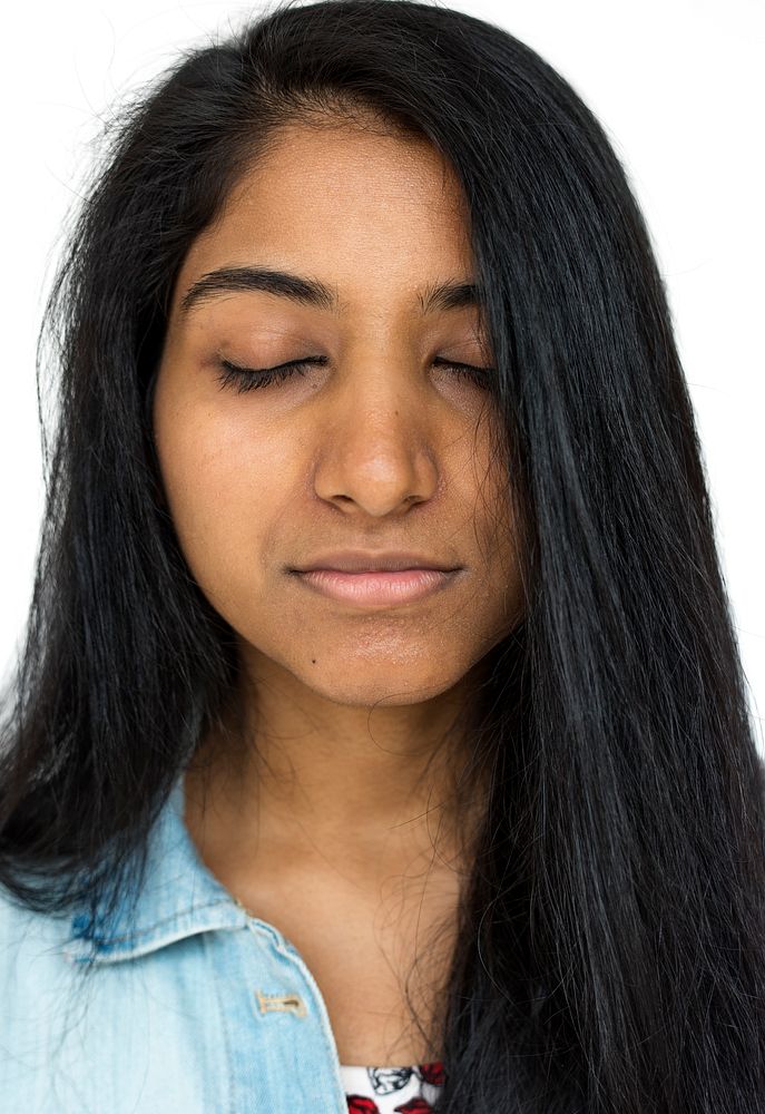 Indian girl close eyes calm and peaceful meditation