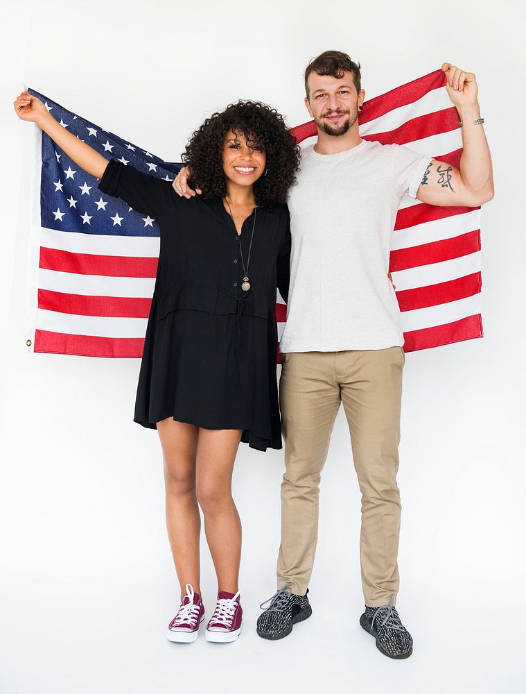 Americans holding the USA flag